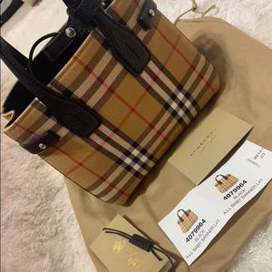Selling Burberry baby banner check bag